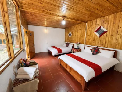Deluxe Queen Room with Two Queen Beds — Muong Hoa Valley View Farmstay